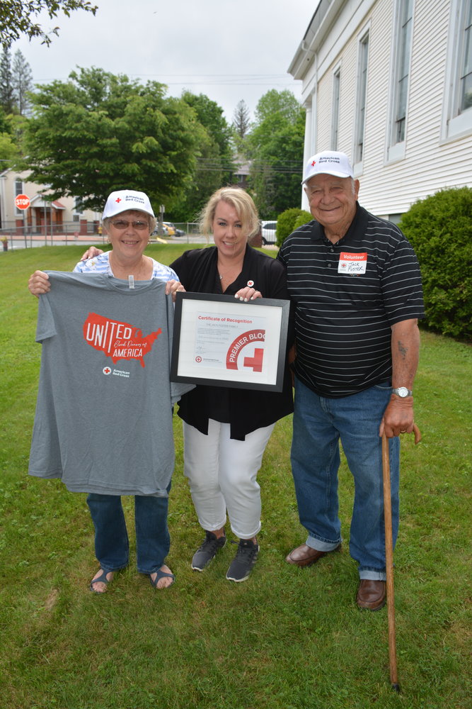 Lynn Pettit (center), American Red Cross Account Manager for Sullivan, Broome and Delaware Counties, presents Marjory and Jack Foster with a certificate of recognition at last Thursday’s Blood Drive.