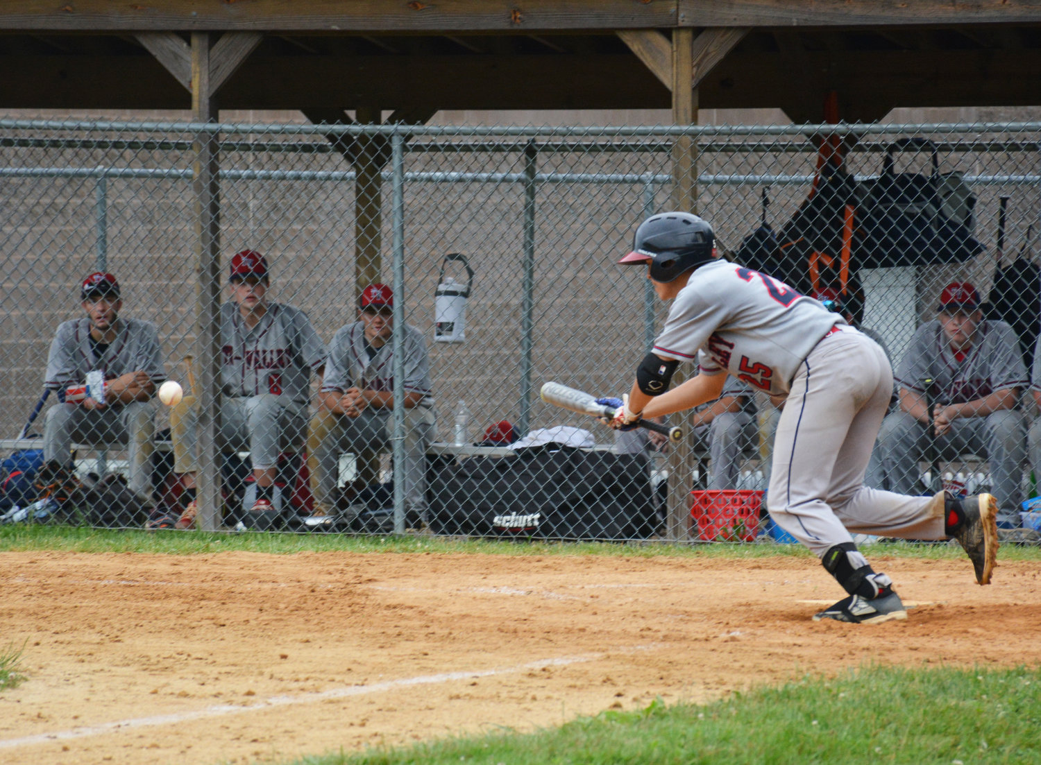 Tri-Valley's Sean Feliciano executes a perfect safety squeeze bunt to bring the go-ahead run home.