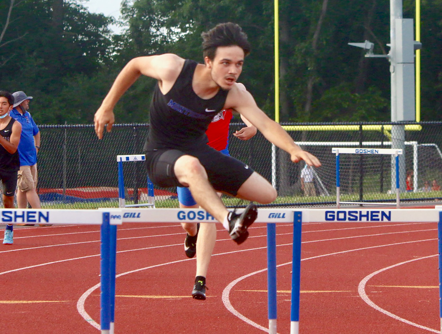 Monticello senior Elijah Rausch wins the 400 hurdles in a personal best time of 57.67. He captured second place in the 110 hurdles with a PR of 15.54.