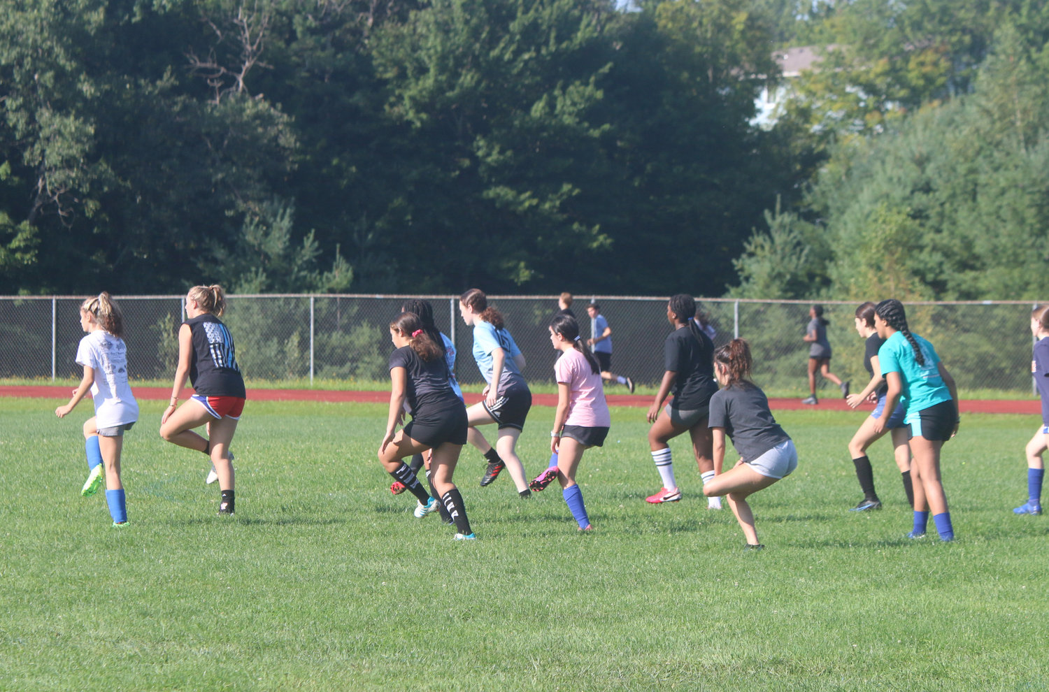 Monticello girls soccer players get underway with step drills on a sultry August morning. Players were reminded to stay hydrated in the late summer heat.