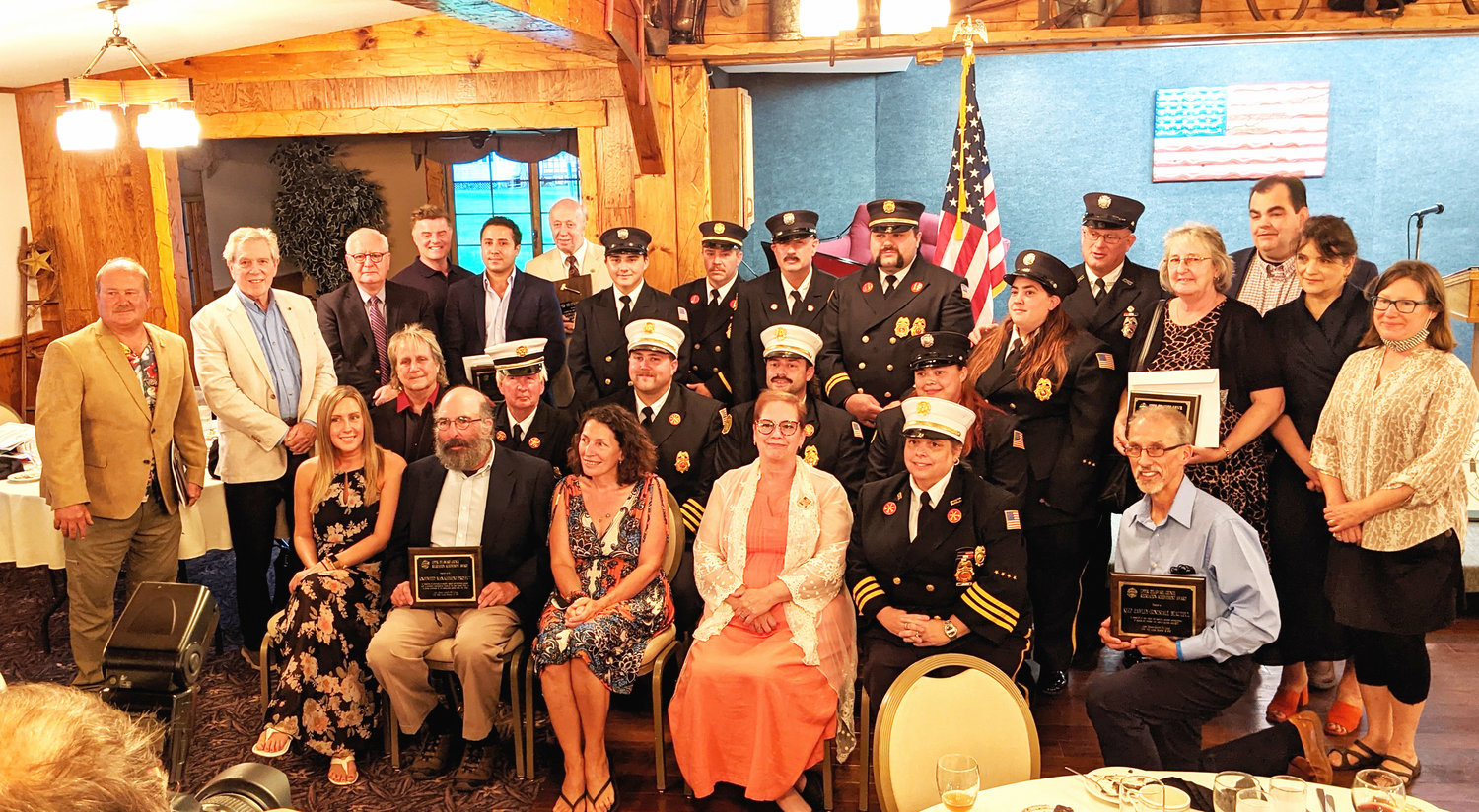 The 2021 Upper Delaware Council Honorees are as follows: Seated first row (left to right) are Richelle Dufton, Steve Schwartz, Sherri Resti Thomas, Bonnie Sheard, Sparrowbush Engine Co. (SECO) 2nd Assistant Chief Danielle Glynn, Mike Coppola. Seated 2nd row (left to right) are Rocky Pinciotti, Deputy Chief Jack Flynn, 2nd Assistant Chief Carl L. Van Horn, Chief Jeremy Swingle, Firefighter Kayla Degraw (SECO). Standing (left to right) are Highland Town Supervisor Jeff Haas, Andy Boyar, John Conway (The Delaware Company), Tim Bruno (WJFF Radio Catskill), Steve Melendez (The Delaware Company), Larry H. Richardson, Firefighter Scott Glynn, 2nd Lt. Kevin Fisher, Fire Police Captain Marty Reiser, Captain Michael Reiser, Firefighter Heather Van Horn, Dive Master Chris Morgan (SECO); Delaware Town Clerk Tess McBeath, Sullivan County Legislature Chairperson Robert Doherty, Sullivan County Planning Commissioner Freda Eisenberg, and Sullivan County Senior Planner Heather Jacksy.
