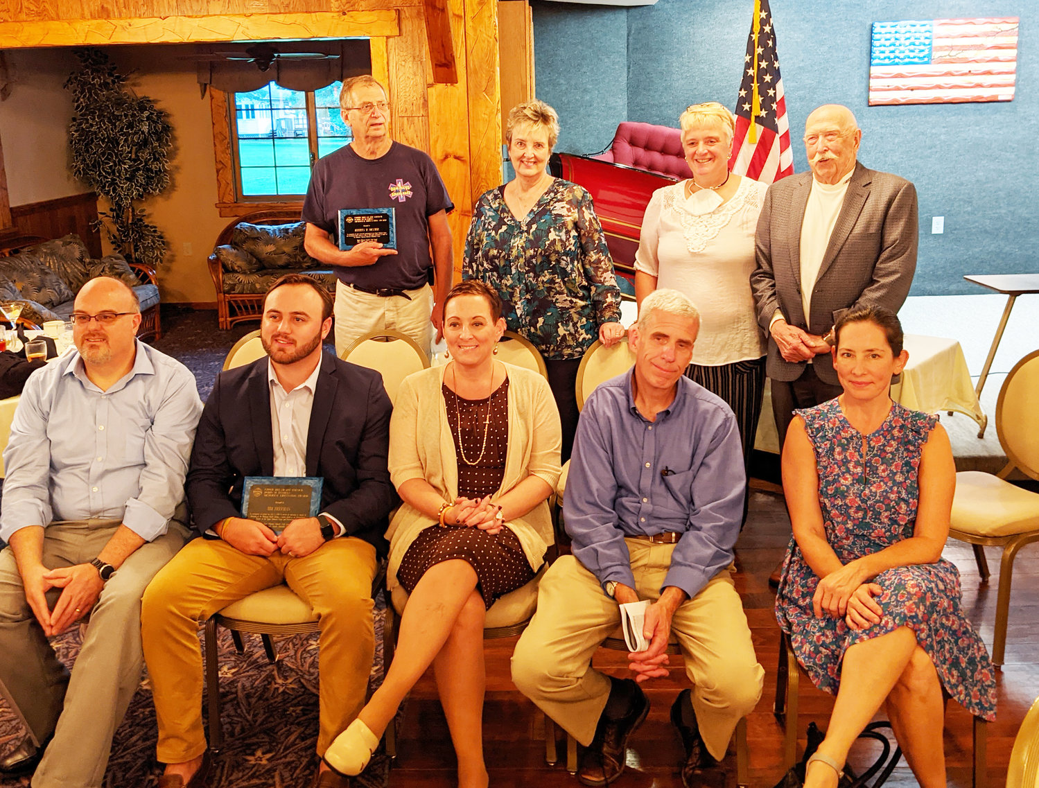 The 2020 Upper Delaware Council Honorees include (Front row from left) Paul Freeman, Andrew Freeman, Karen Freeman (family of the late Tim Freeman), Robin M. Daniels Memorial Lifesaving Award; John Ogozalek, Special Recognition Award; Tina Spangler, director of the Big Eddy Film Festival, Cultural Achievement Award. In the Back row, from left, Jeff Dexter (Damascus Township Volunteer Ambulance Corps), Robin M. Daniels Memorial Lifesaving Award; Carla Hauser Hahn, Special Recognition Awards; Kim Erickson and Fred Murray (representing Wayne County Historical Society’s 1888 Spencer Tractor Restoration), Cultural Achievement Award. Missing from photo are Pennsylvania Representative Jonathan Fritz (111th District), Rep. Michael Peifer (139th District), and Senator Lisa Baker (20th District), UDC’s Advocacy Award; Harold G. Roeder, Jr., Distinguished Service Award; Star Hesse, Volunteer Award; Paddy McCarthy, James Moss, Johnny Smith, Andy Moss, Robin M. Daniels Memorial Lifesaving Award; Dr. Heather Galbraith, Carrie Blakeslee, Jeff Cole, and Barbara White, USGS Northern Appalachian Research Laboratory, Partnership Award; Nancy Furdock, Community Service Award; Dan Plummer, Friends of the Upper Delaware River, Inc., and Bill Streeter, director of the Delaware Valley Raptor Center, Recreation Achievement Awards.