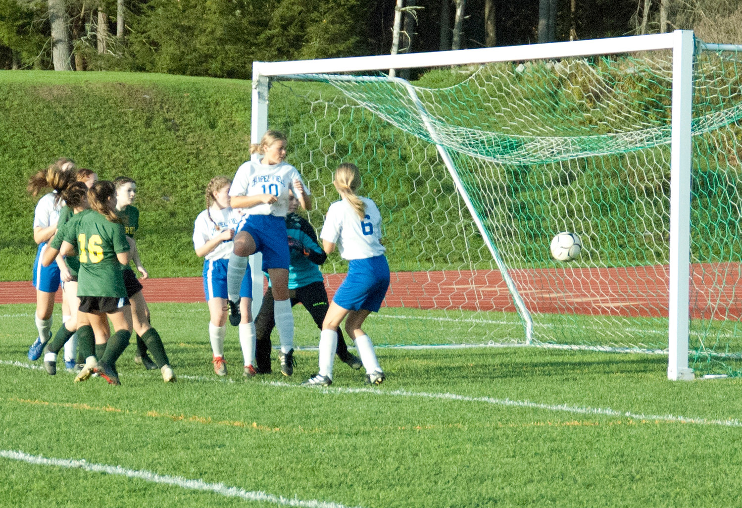 Eldred and Chapel Field players look on as a shot floats past the defense and into the goal in the first half of Thursday’s game.