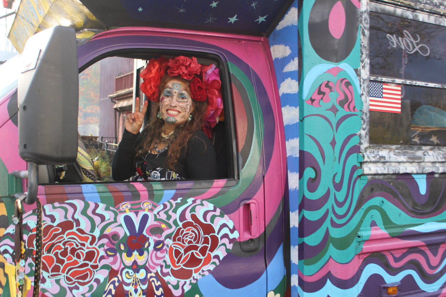 Debbie Fisher Palmarini participated in the parade behind the wheel of her Sunshine Bus.