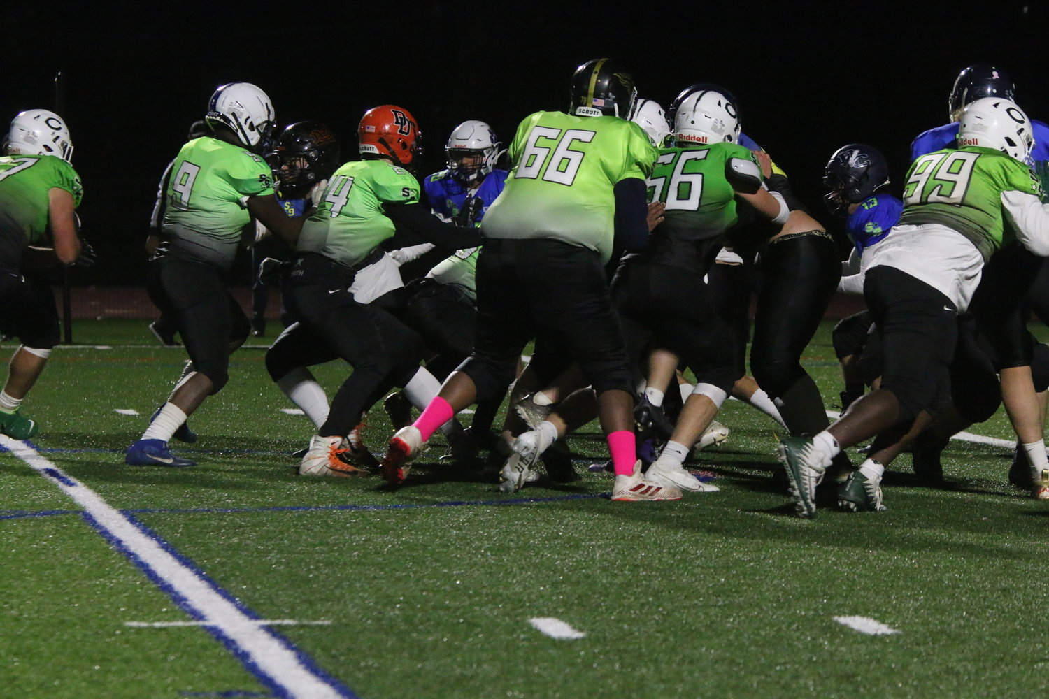 Fallsburg’s Bryan Akinde (66) uses his imposing size to impact a play at the line of scrimmage.