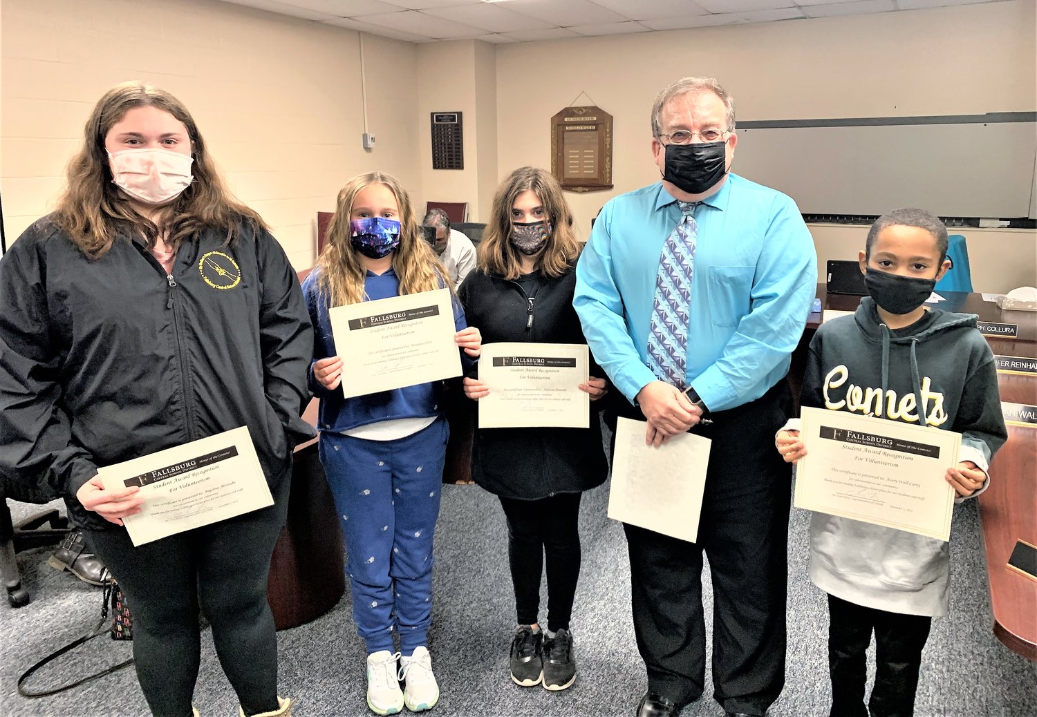 From left to right Angelina Alvarado, Annalise Clark, Addison Alvarado, Board of Education member Mike Weiner, who presented the certificates, and Avery Wall-Carty. Jayden Johnson was unable to attend the ceremony and was given her certificate at a later date.
