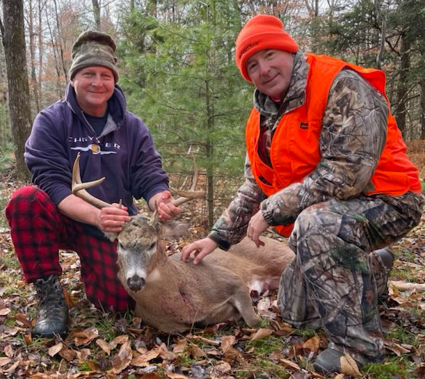 Glen Akerley, right, was hunting in the 3H zone in Fallsburg when he harvested an 8-pointer. The buck scored a 65.5 and had 19.25 inch beams and a 19 in outside spread.