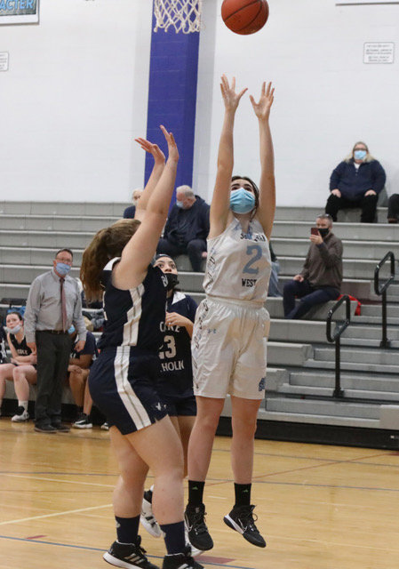 Power in the paint: Sullivan West senior Taylor Wall fires one in for two of her game-high 22 points in the win over Burke.