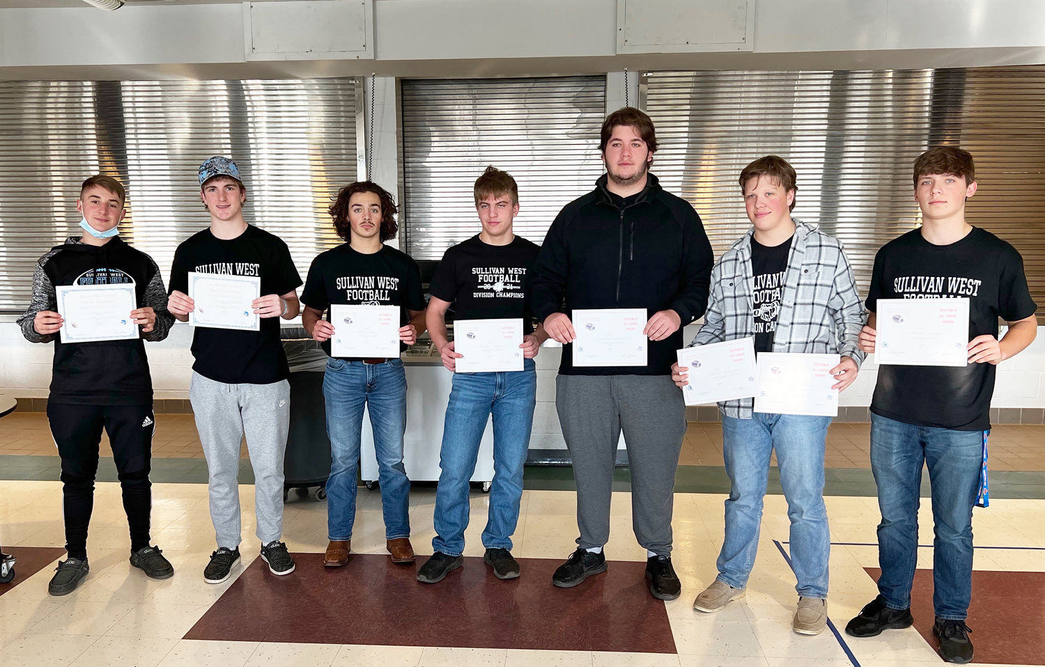 Section IX First Team League All-Stars included Rally Cruz (third from left), Jakob Halloran, Chris Campanelli, Gavin Hauschild and Justin Grund. Honorable Mention was awarded to Jacob Hubert (far left) and Jaymes Buddenhagen.