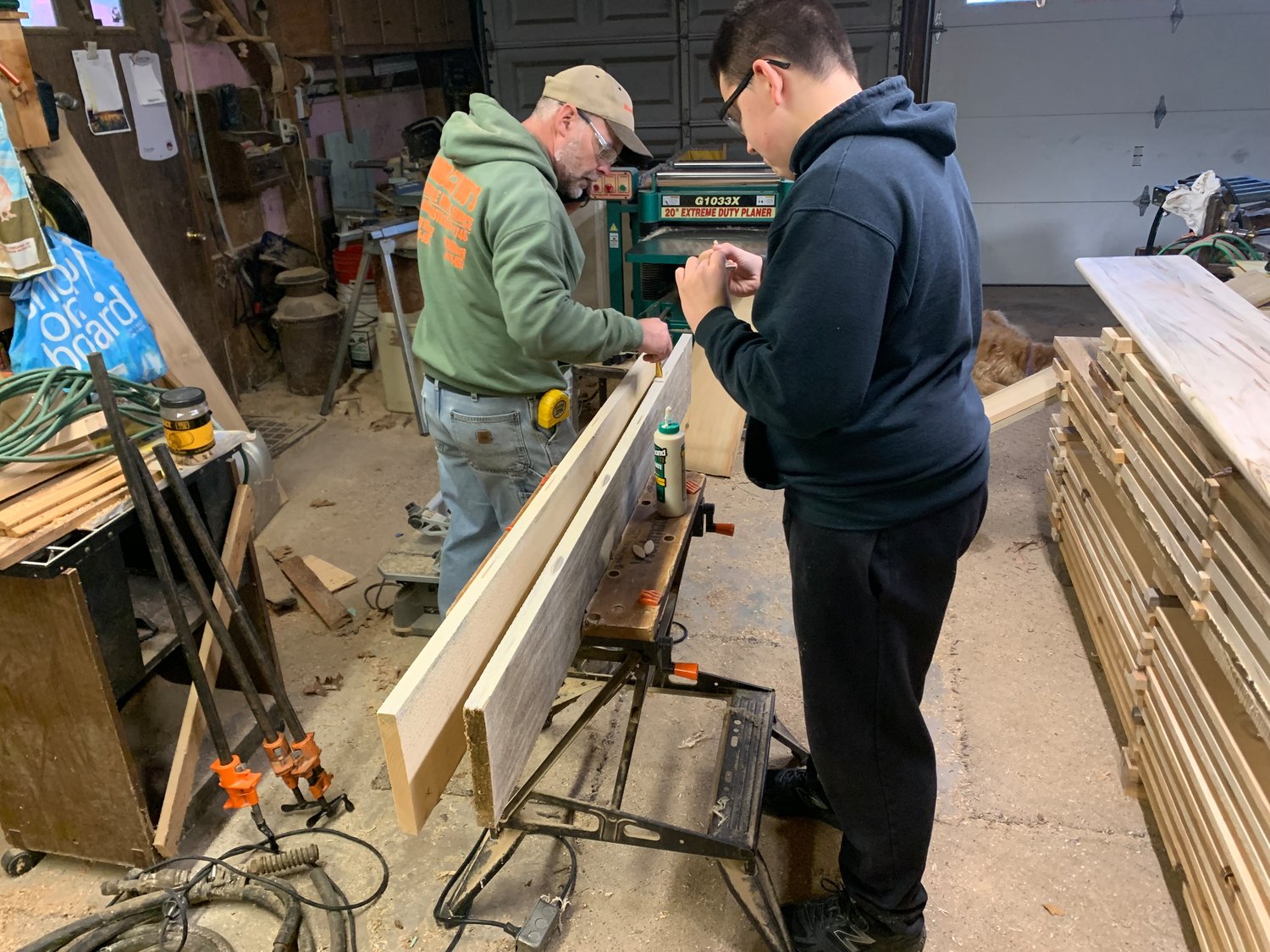Ethan Raykoff (right) works with Boy Scout Troop 97 Scoutmaster Neil Terwilliger as he begins work on his Eagle Project, building Little Free Libraries for Town of Neversink parks.  The project will be completed in the spring with the help of volunteers under Raykoff’s leadership.