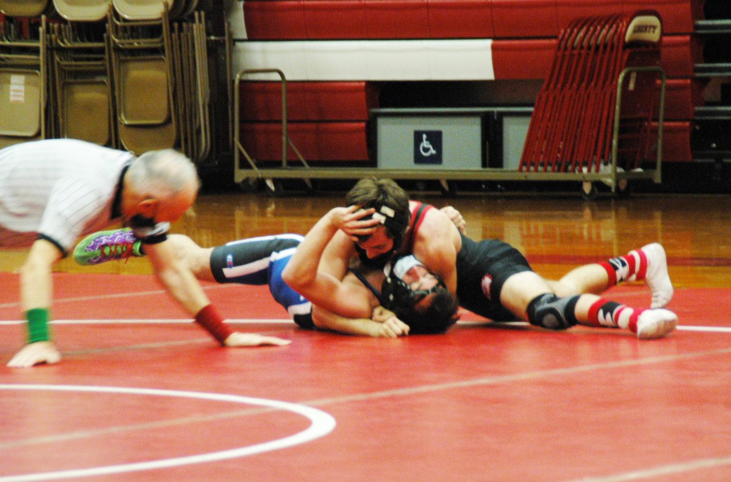 Timothy Dirie (Liberty) pins Isaac Hernandez (Monticello) to the mat.