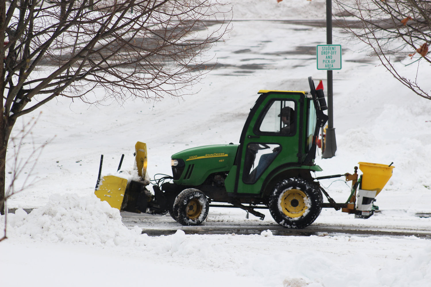 Crews were busy clearing snow from the Liberty Elementary School parking lots on Monday afternoon.