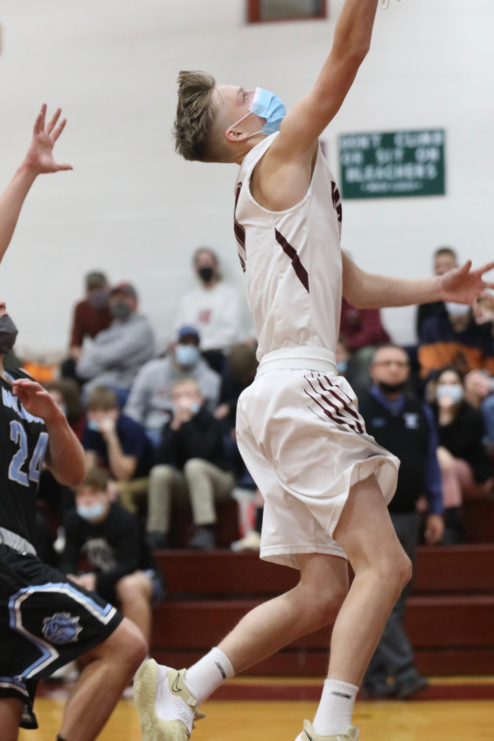 Livingston Manor’s Matthew Bowers goes up strong for two of his nine points.