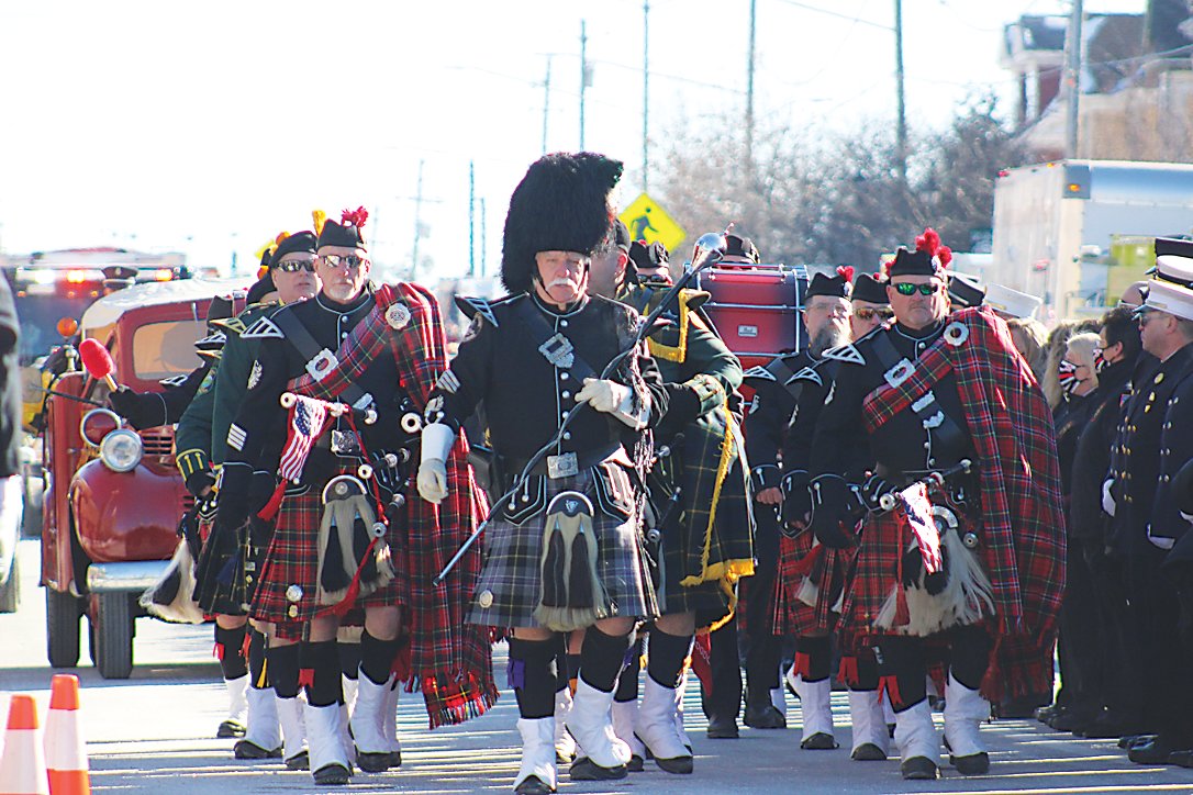 Terrance Mullen (center) leads a group of bagpipes and drums during the funeral procession. Groups who participated included the Orange County Firefighters Pipes and Drums, Hudson Valley Regional Police Pipes and Drums, NYS Fire Pipes and Drums, Rockland County Firefighters Pipes and Drums and the New York State Police Pipes and Drums.
