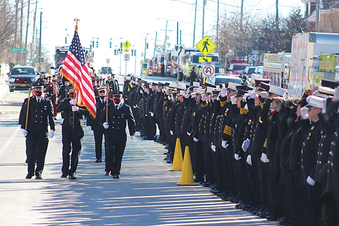 Firefighters lead the funeral procession in memory of Forestburgh Fire Company Assistant  Chief William “Billy” Steinberg down Broadway in Monticello on Saturday, January 22.