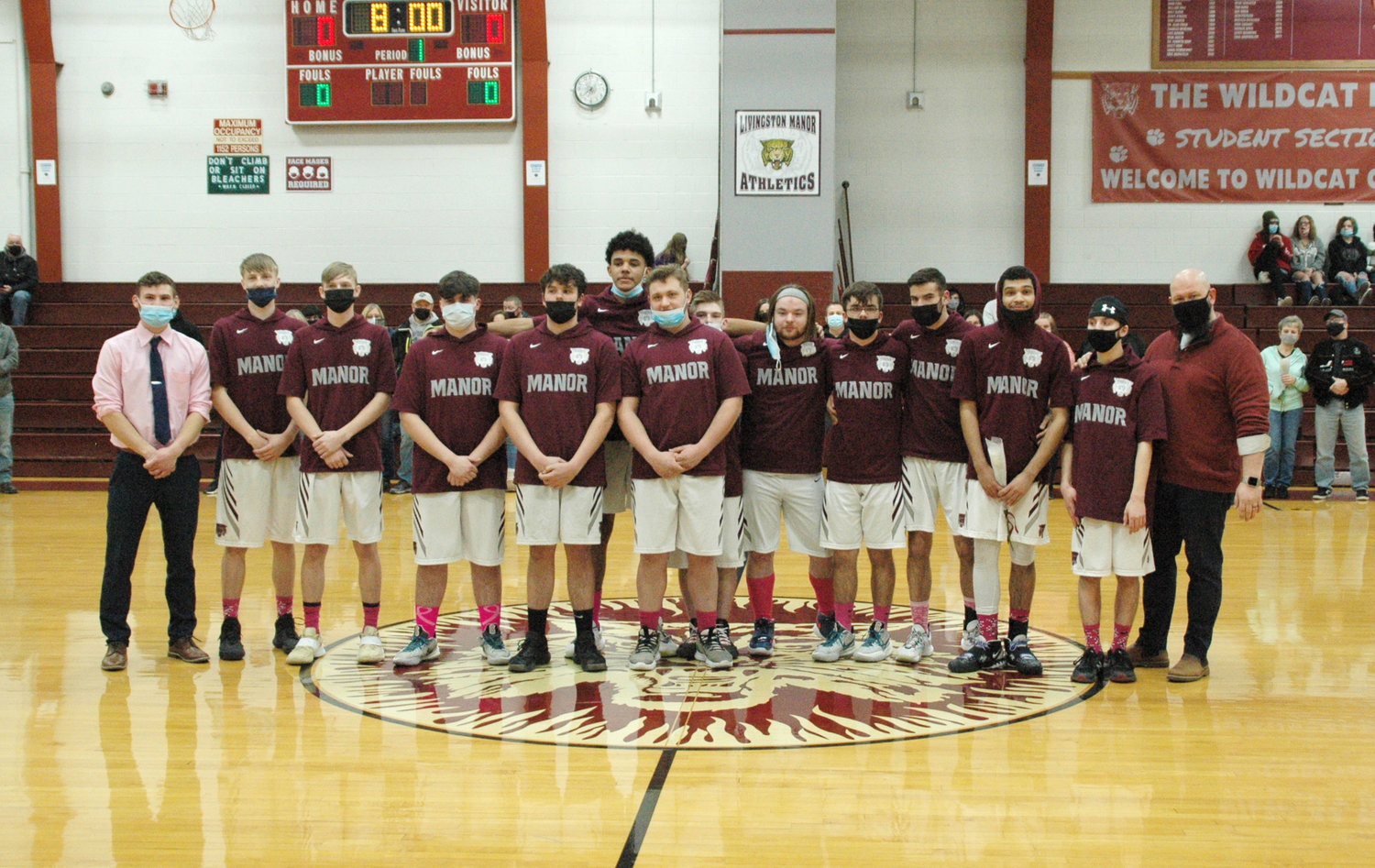 Livingston Manor’s 11 seniors were joined by their coaches and only underclassman, Daniel Tolbert, for a photo during their senior recognition night.