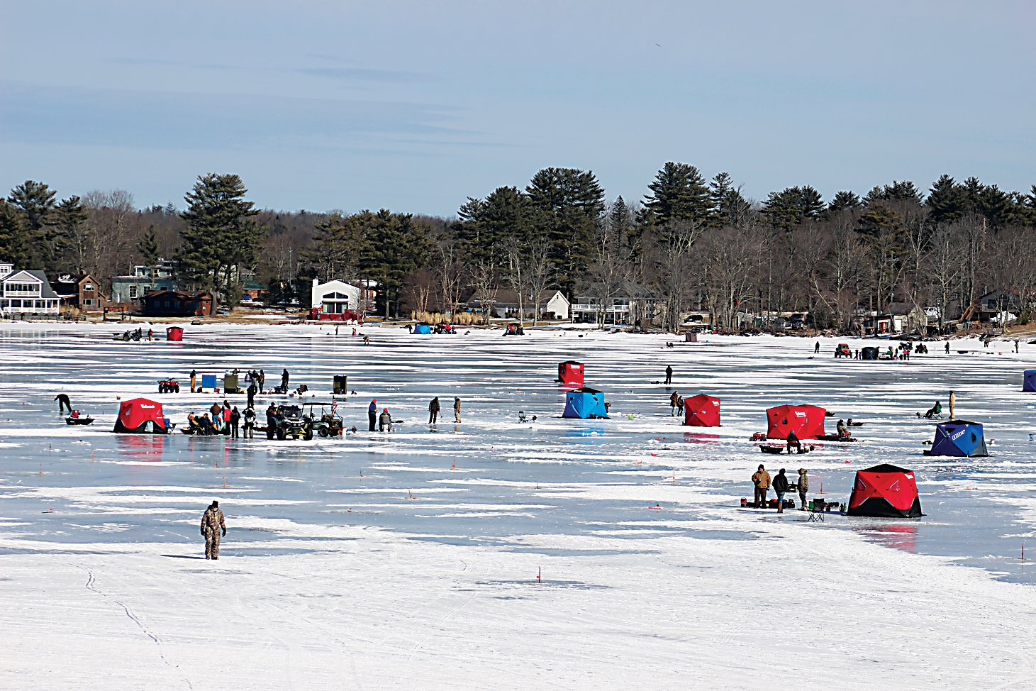 Participants in the annual King of the Ice fishing tournament were spread out across White Lake on Sunday.