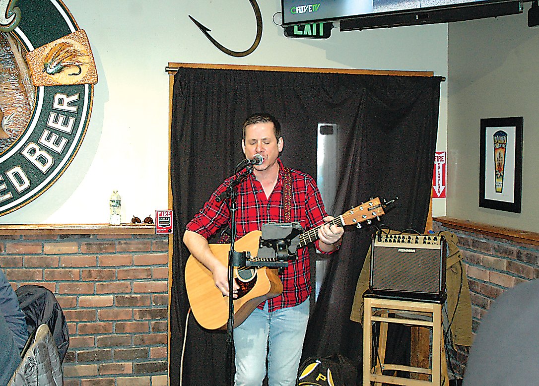 Musician Albi Beluli kept the crowd singing and serenaded inside Roscoe Beer Company as the Trout Town Ice Festival continued throughout the hamlet.