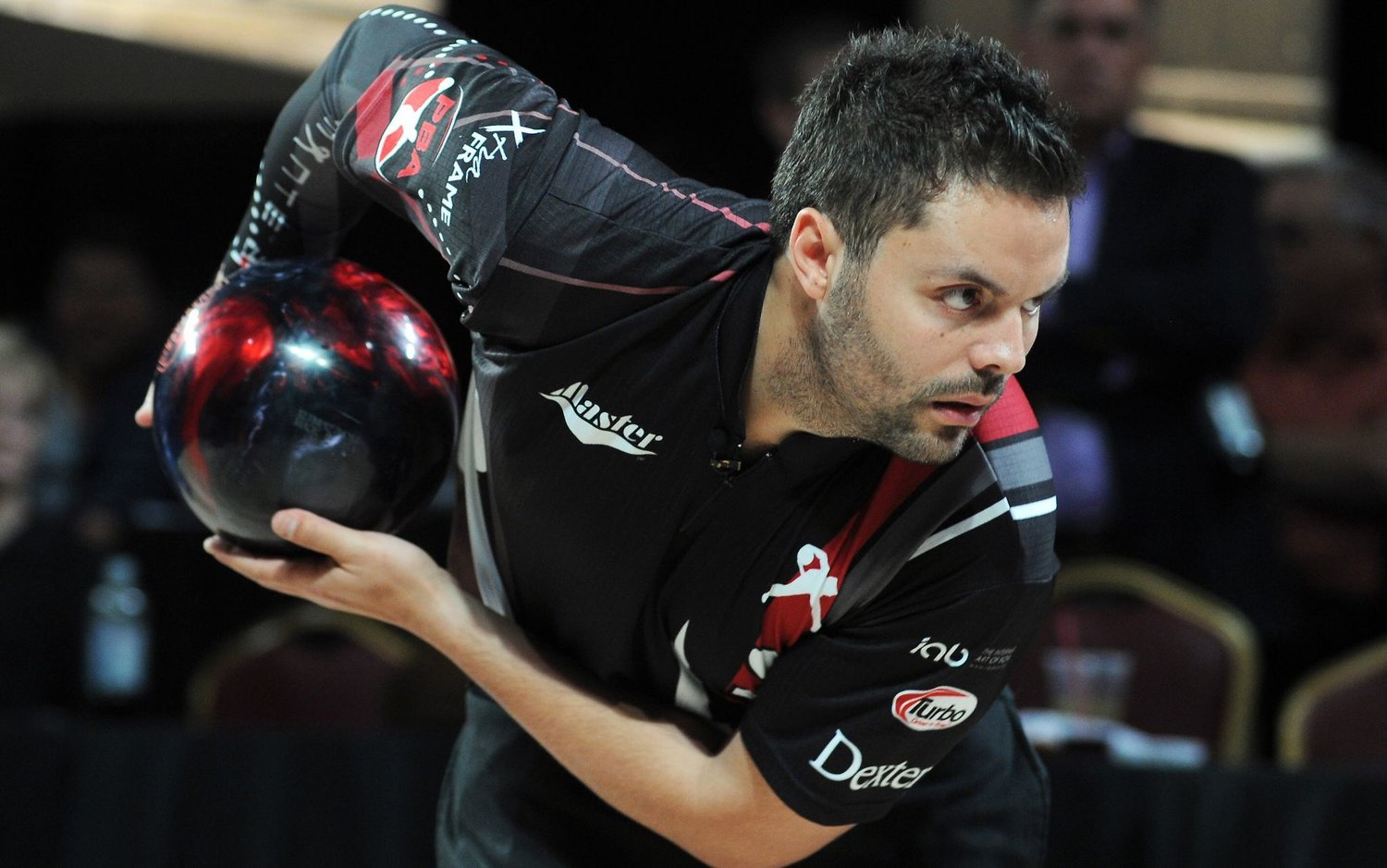 Professional Bowling Association (PBA) Champion Jason Belmonte shows his technique with the two-handed style of bowling.