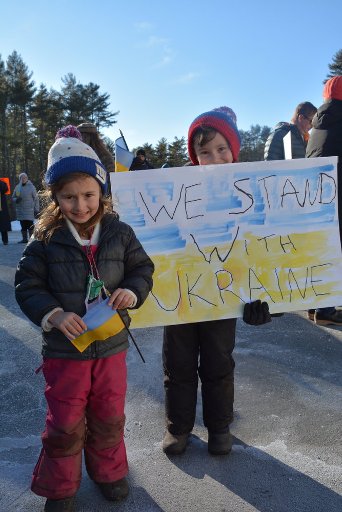 Bobbie and older brother Max came prepared to stand with Ukraine, bringing their own homemade sign.