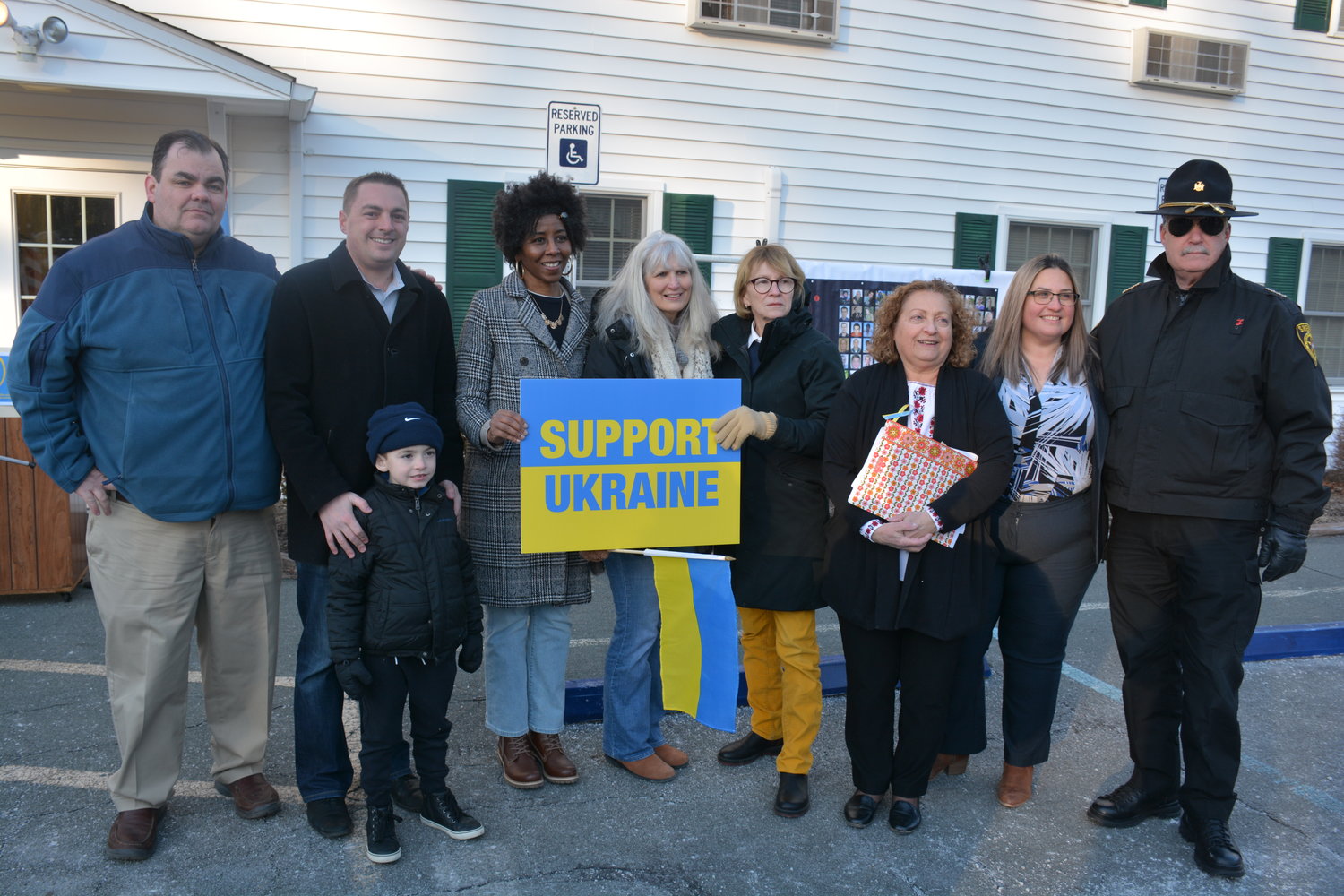 At Friday’s rally, from left, are Legislative Chairman Robert A. Doherty, NYS Senator Mike Martucci (with son Michael Jr.), Human Rights Commissioner Adrienne Jensen, County Treasurer Nancy Buck, NYS Assemblywoman Aileen Gunther, District 2 Legislator Nadia Rajsz, District Attorney Meagan Galligan and Sullivan County Sheriff Mike Schiff.