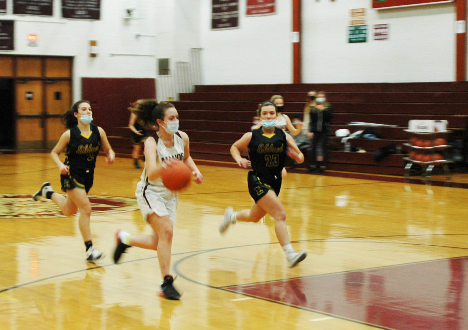 Davis runs the fast break after a steal. Turning defense into offense became routine for number 24 during the season.