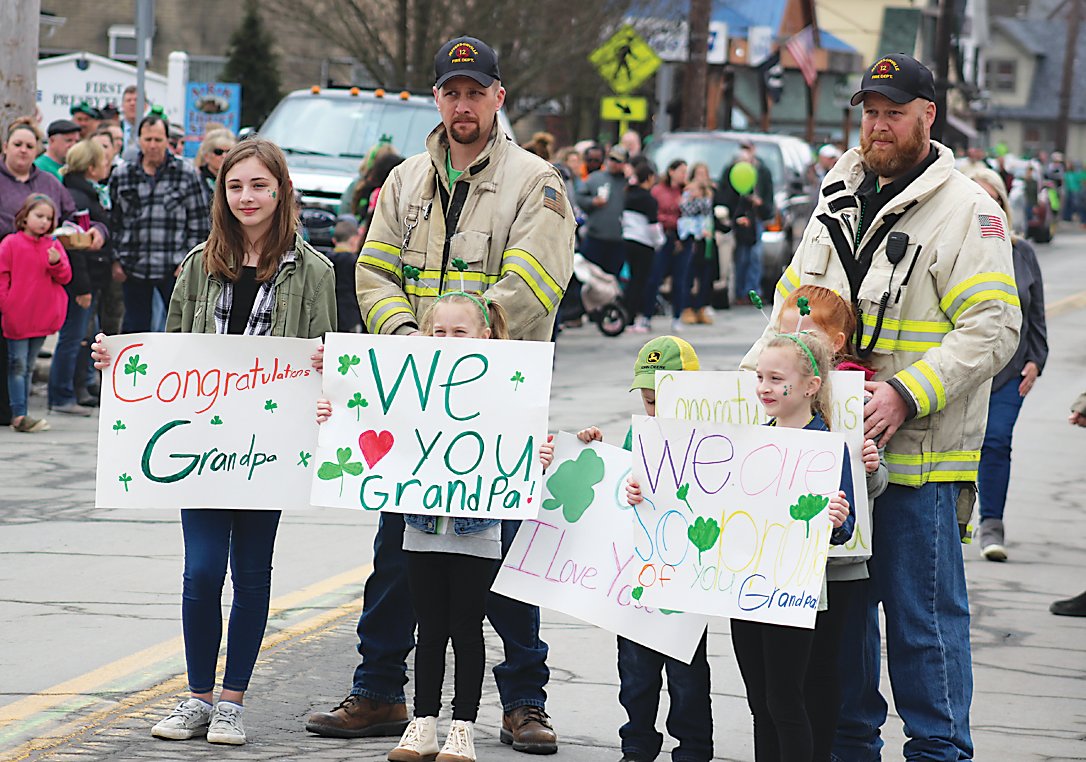 Parade Grand Marshal Lee Mall was cheered on by his family, including sons Jonathan and Joe, as well as grandchildren Sara, Lily, Claire, Olivia and Wyatt. The Malls are Chief and Assistant Chief of the Jeffersonville Fire Department.