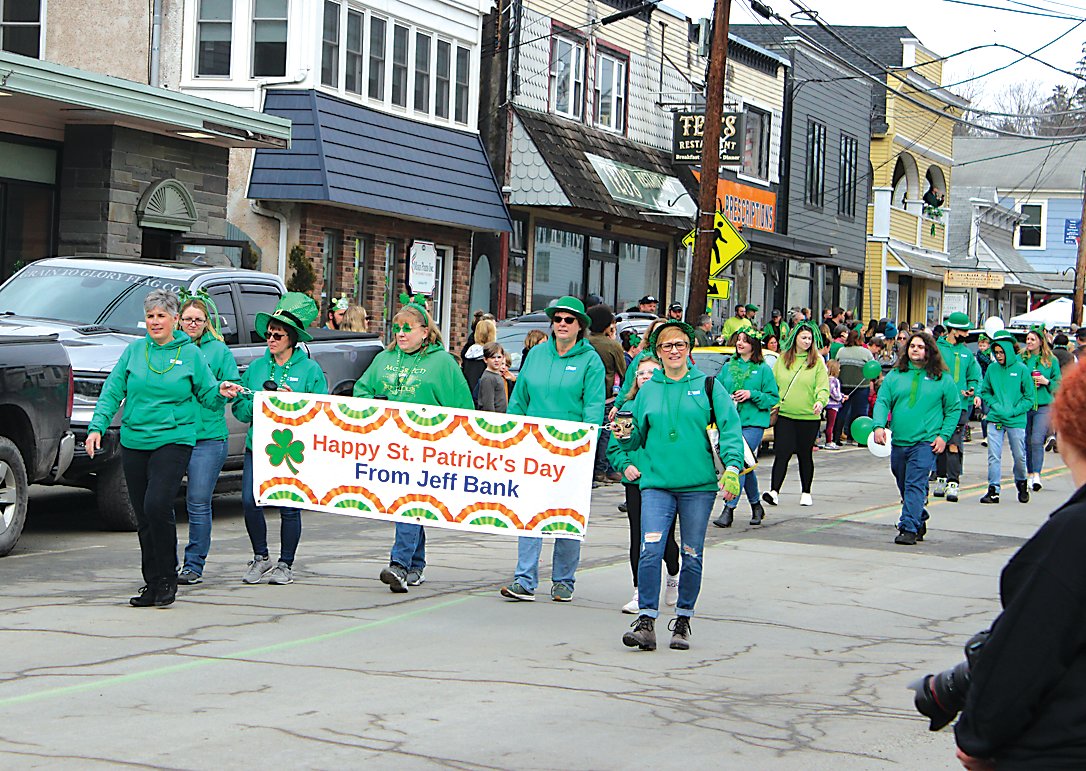 Employees of Jeff Bank, one of the parade’s sponsors, proudly wore their green.