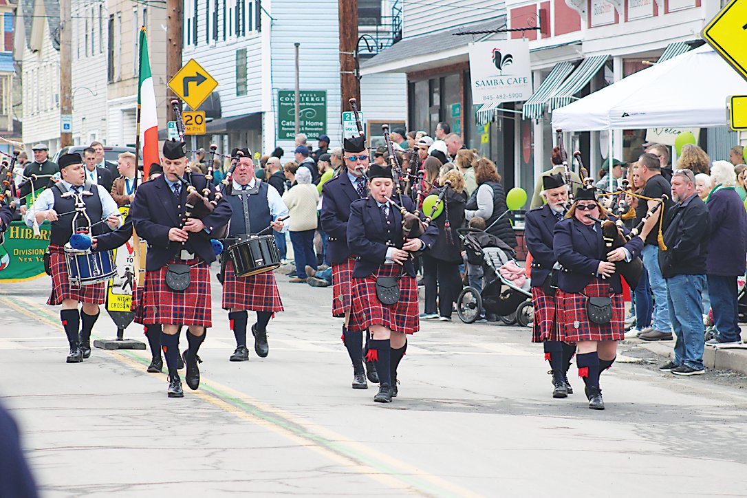 Firefighter McPadden Pipes and Drums have returned every year to march in Jeffersonville’s Saint Patrick’s Day Parade.