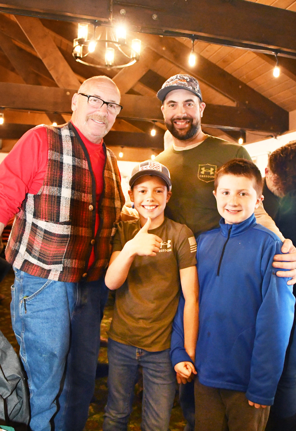 Three generations of the Darder family enjoyed Sunday’s fundraiser and took home some great prizes, too. From the left are Mike Darder, his grandson Jack, son Forest and second cousin Hudson Brigham.
