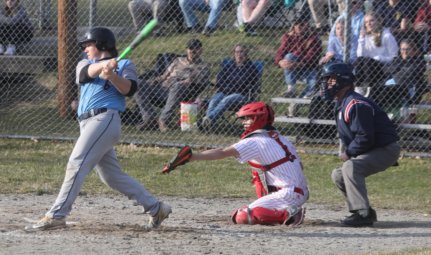 Sullivan West senior Gavin Hauschild blasts a double in the third inning. He amassed  four RBI in the game.