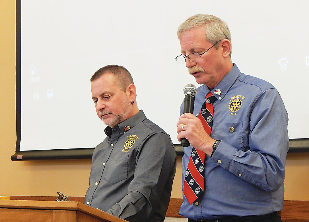 Gary Silver, left, and Gary Siegel, Liberty Rotarians who chair the club’s Haiti Clean Water Program Committee, give an update on the efforts in Haiti.