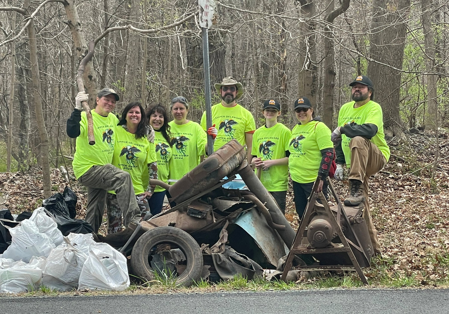 From left to right-Andy Russ, Susan Fraysse Russ, Liz Peterson, Jamie Macri, Austin Hand, Sadie Hand and Sarit Hand. During the Upper Delaware Council’s Litter Pluck last weekend the amazing Dark Forest Creation Crew of volunteers from the Burn Brae Mansion in Glen Spey found loads of metal buckets, piles of tires, bottles, almost an entire car, a bumper with the license plate still attached and a rusted out Sears and Roebuck cement mixer and filled an additional twenty bags with trash. Andy Russ summed up all their hard trash collecting saying “we are undoing the misdeeds of others.”