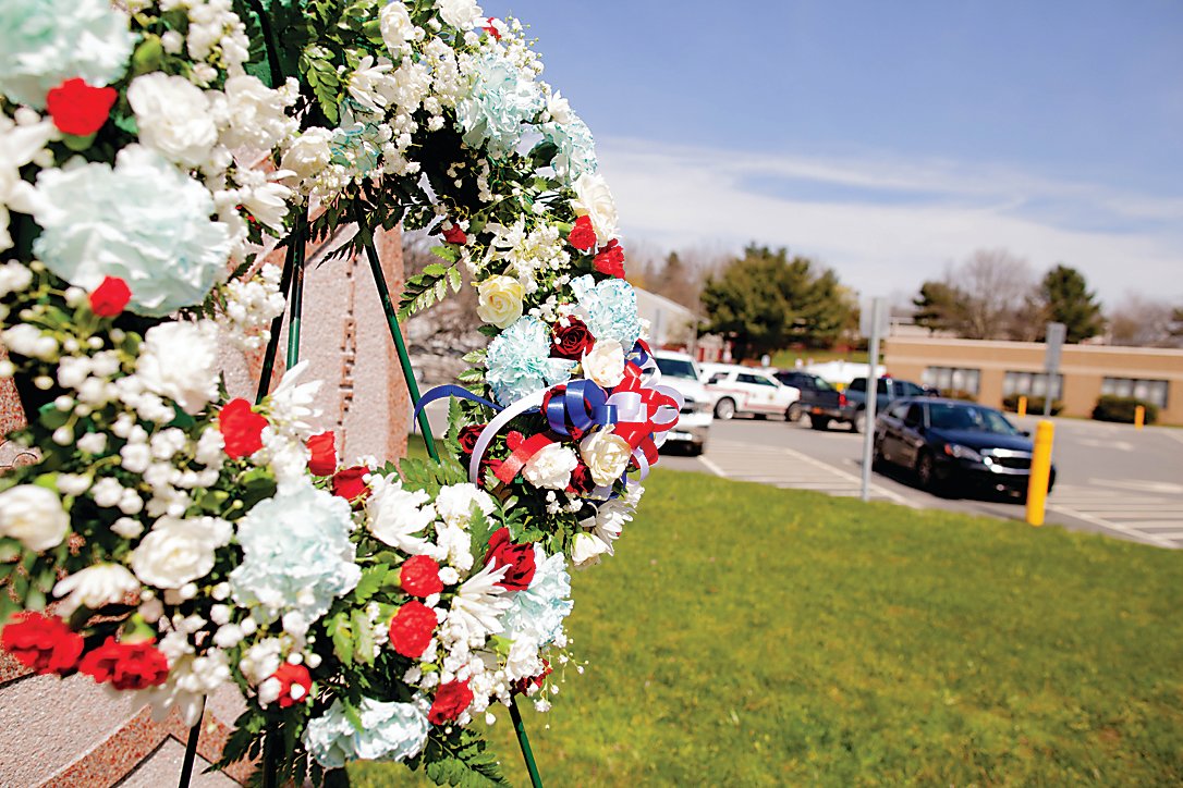 A wreath is laid down by the Firefighter memorial that sits in front of the Sullivan County Government Center in Monticello during the Sullivan County Volunteer Firefighters Association 63rd Annual Memorial Service