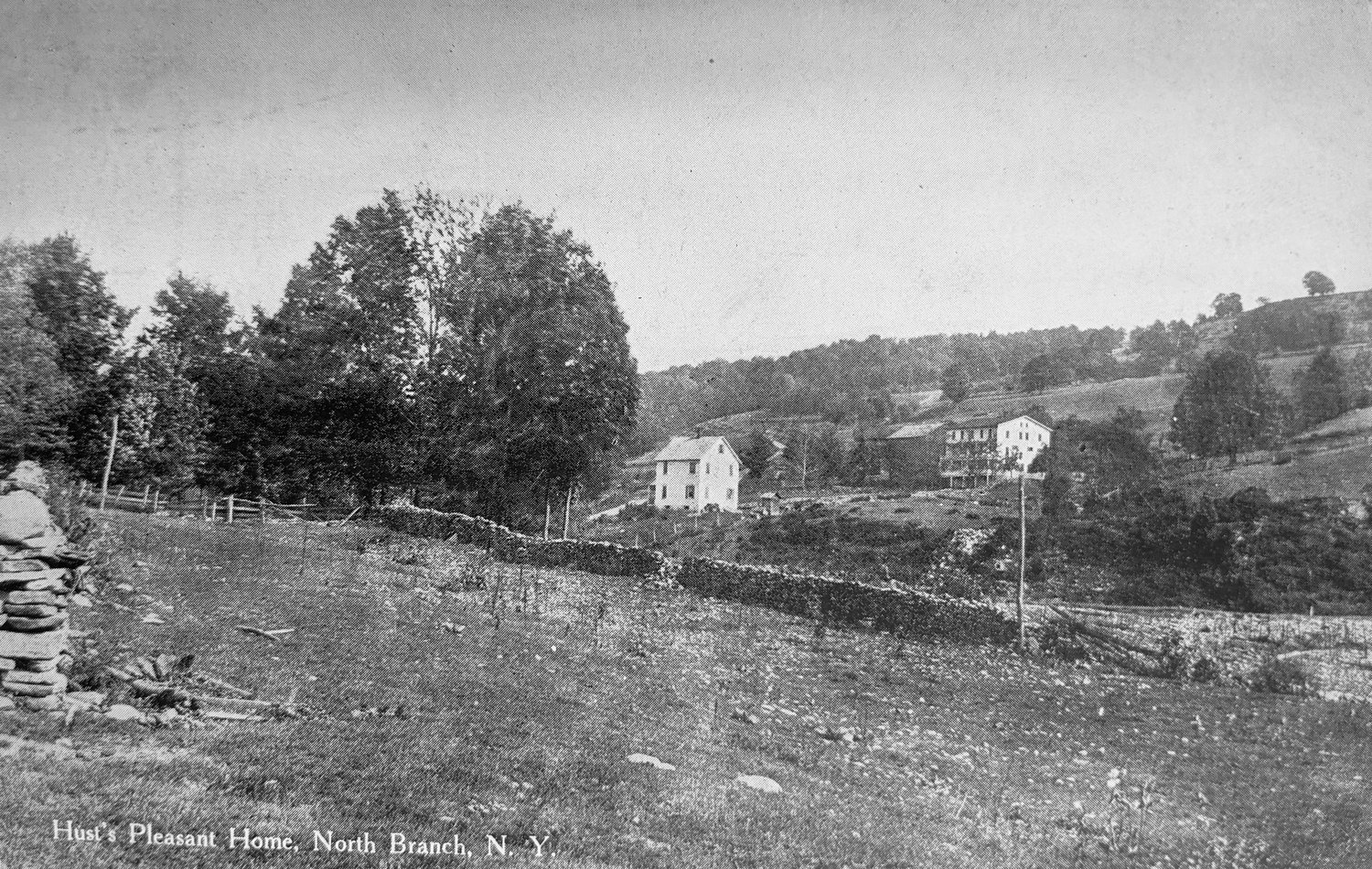 Hust’s Pleasant Home

This postcard by G.V. Millar shows Hust’s Pleasant Home in the background at right. Located on Bayer Road in North Branch, it was built by Preston Goodman, whose wife, Carrie Hust, ran a boarding house there. Goodman and his wife removed to Binghamton in later years, and Harold Hust and his wife Mildred operated a dairy farm on this property. From the Albert VanDyke collection at the Sullivan County Historical Society in Hurleyville.