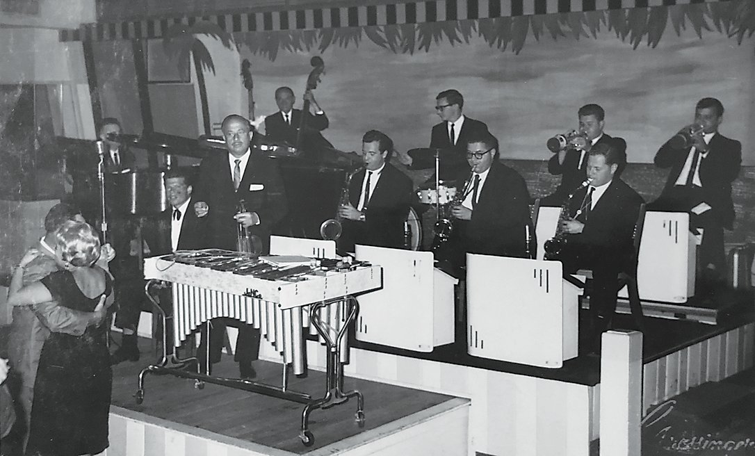 Eddie Ashman, third band member from left conducts the show band at Grossinger’s Hotel. Frank is seated just to the right of him.