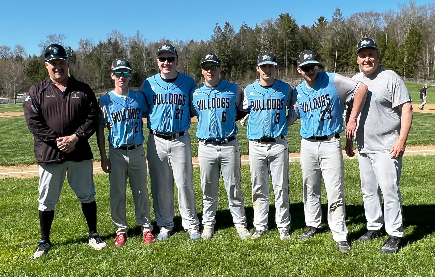 Sullivan West seniors were recognized before the game. (Left to right) Head coach Bill Kirk, Dominic Perez, Jake Nystrom, Gavin Hauschild, Justin Grund, Ryan Sayers and Assistant Coach Scott Haberli.