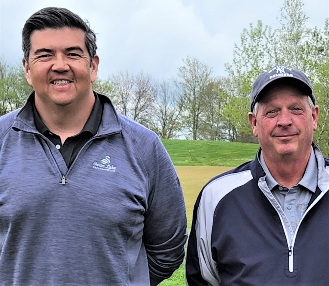 The wheels that keep golf alive at the Swan Lake Golf & Country Club include, from the left, Todd Gallo, who is the general manager for the Gallo family owners, and Bob Menges, head golf professional.