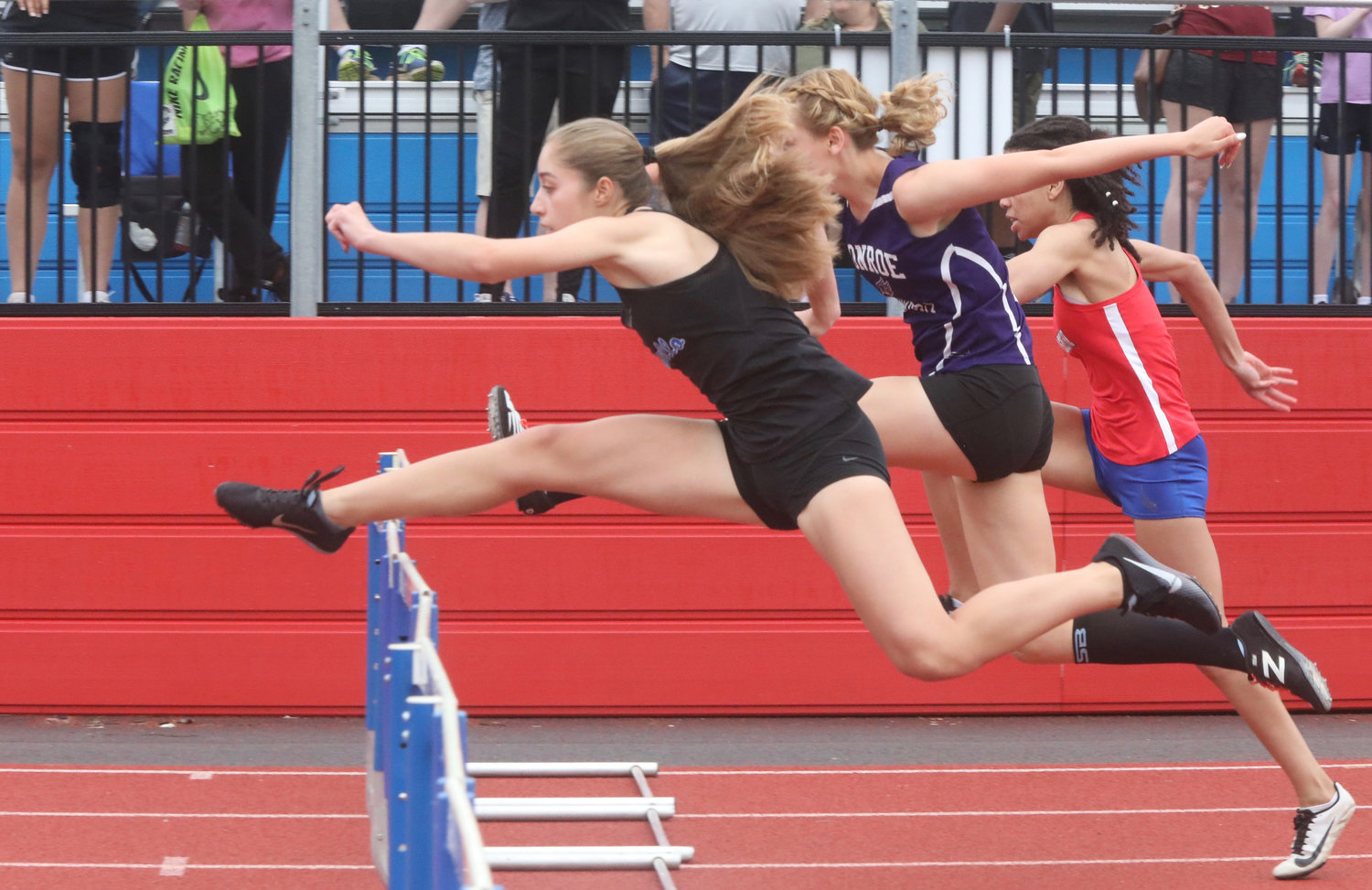 Monticello’s Taina DeJesus took second in the 100 hurdles and captured gold in the 400 intermediate hurdles.