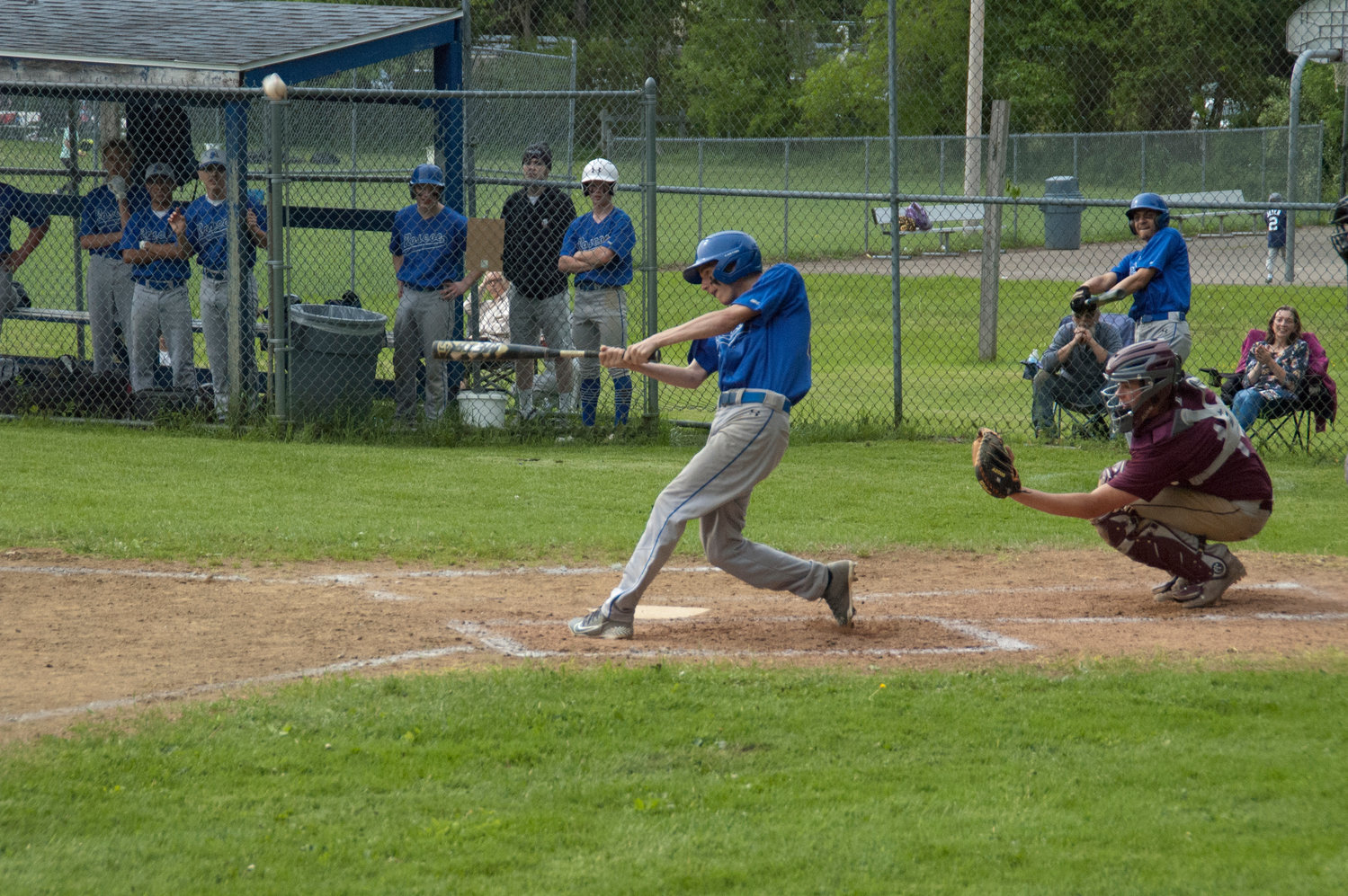Anthony Zamenick drives a ball into deep left field and drives in two early runs for the Blue Devils.