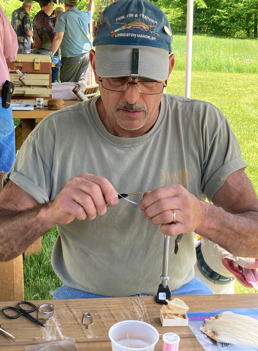 “Catskill John” Bonasera and other members of the Catskill Fly Tiers Guild tied trout flies at the celebration of Davidson’s General Store.