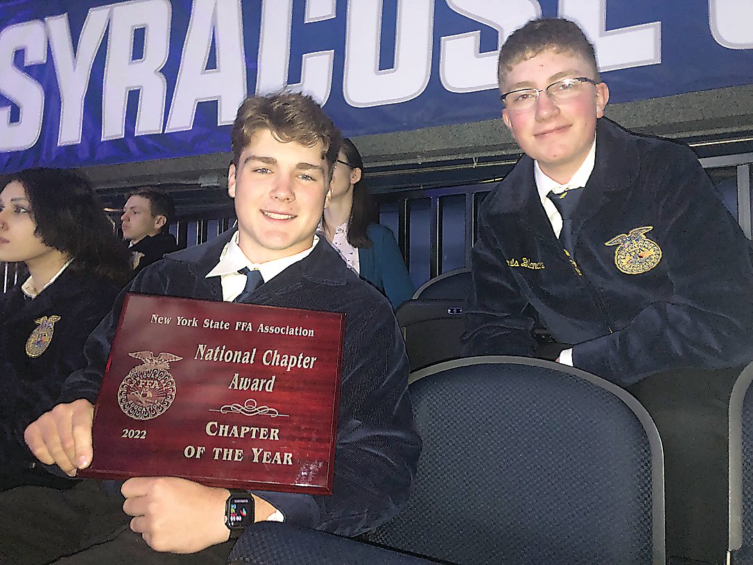 Dylan Poley (Left) and Louis Bilancione pose with the Chapter of the Year Award.