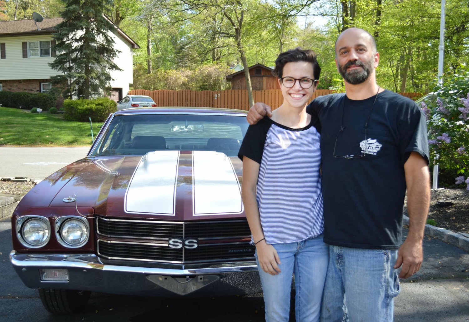 Car enthusiasts Frank Fiori and his daughter Francesca with a custom restored 1970 SS Chevy Chevelle. The Knights of Columbus Council 12571 is sponsoring a Car Motorcycle and Truck Show to benefit their Food For Families and Friends Meals Program. The Show will be held on  June 25th from 10-3pm at St John Neimann Church.