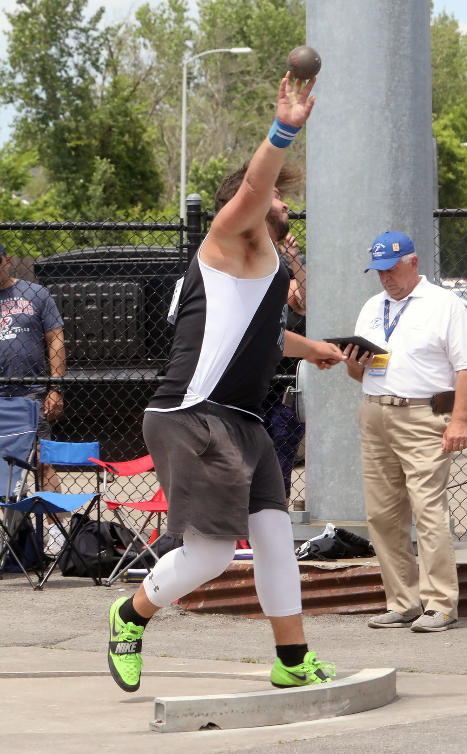 Sullivan West’s Chris Campanelli releases the shot put on his way to a third place finish in the Federation Championships garnering his second medal of the meet. The throw of 53-4.75 was his best ever and rebroke the school record he had set the day before with his Division 2 fourth place heave of 53-06.75. Campanelli was also the Section Nine Sportsmanship Award winner at states.