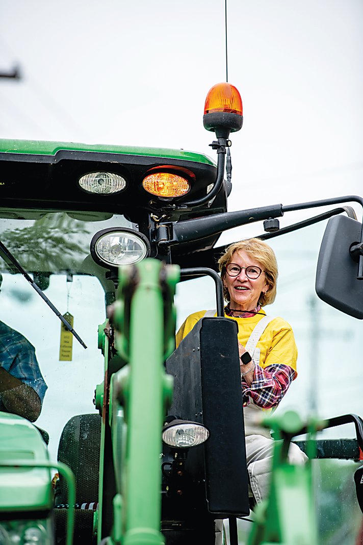 Assemblywoman Aileen Gunther did the honors as this year's parade grand marshal on a tractor driven by Briscoe farmer Dave Weiss.