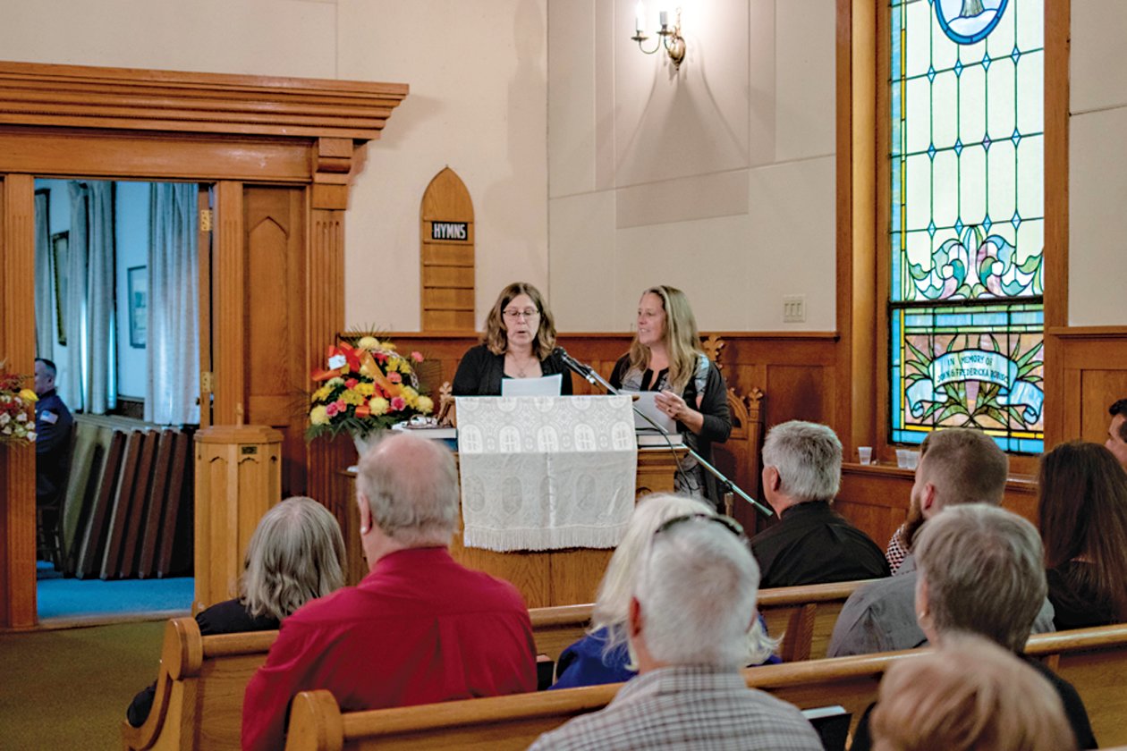 David’s two daughters, Cathy Wilcox, left, and Cindy Menges had the church filled with love and laughter after recounting their father’s life.
