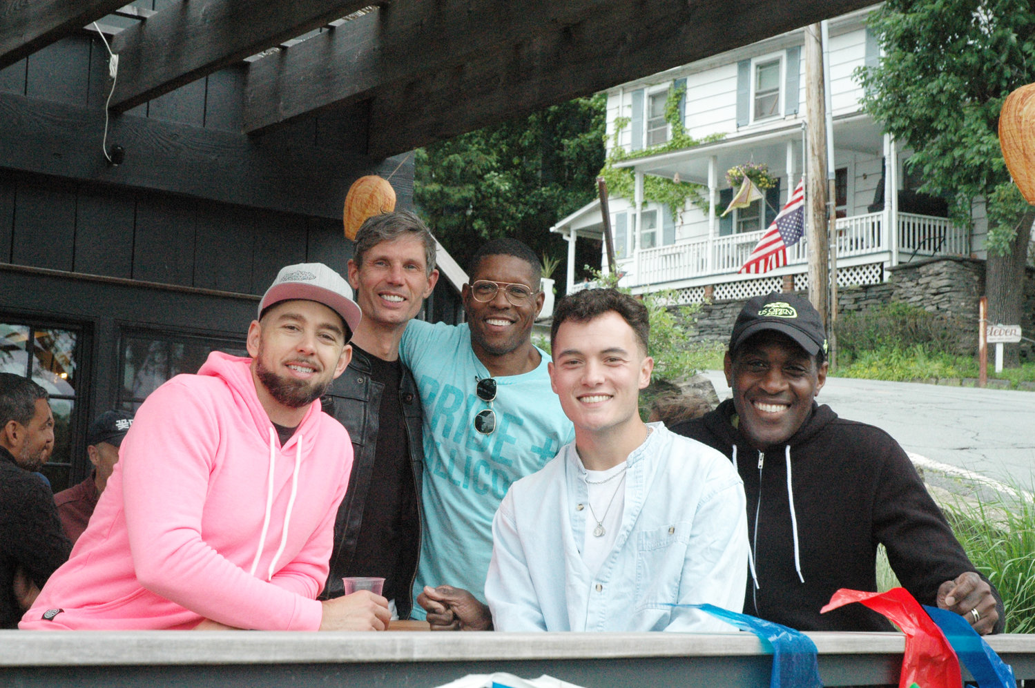Catskills Pride President Dwayne Brown, center, enjoying the day with Pride attendees. From left, David Vallee, Mathew Dempsey, Harrison Sage, and Michael Givens.