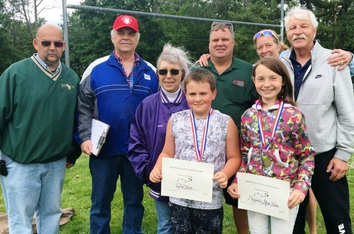 Pictured from left: Past District Deputy Jim Gerrard, Past Exalted Ruler Mike Brennan, Exalted Ruler Ronni Scannell, Tyler Hulse, Past Exalted Ruler Frank Muller, Magnolia Madri-Hulse, Soccer Shoot Chair Betsy Conaty and Past State President Phil Conaty.