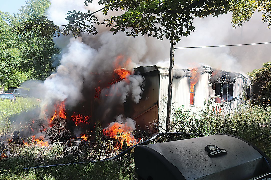 There were no injuries reported from a fire that consumed a trailer home in the Town of Thompson on Thursday.