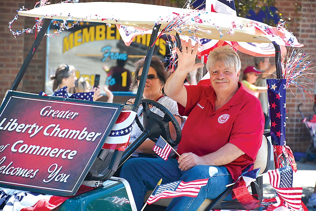 County Clerk Russell Reeves is also the President of the Greater Liberty Chamber of Commerce. Joined by his wife Denise, Reeves waved to the crowd.